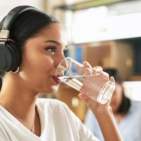 shot of a young businesswoman drinking a glass of 2023 11 27 05 00 22 utc 1