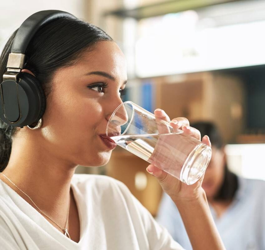 shot of a young businesswoman drinking a glass of 2023 11 27 05 00 22 utc 1